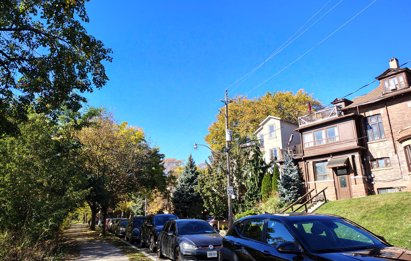 Three photos of the Amica Classical Pilates studio interior and street parking available directly adjacent.