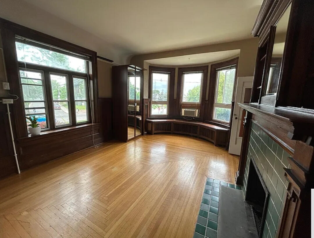 Three photos of the Amica Classical Pilates studio interior and street parking available directly adjacent.